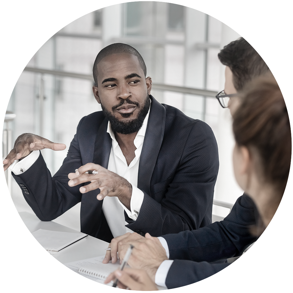 Man speaks to colleagues